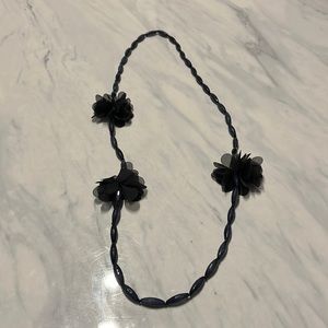 Black beads necklace with whimsical lace flowers